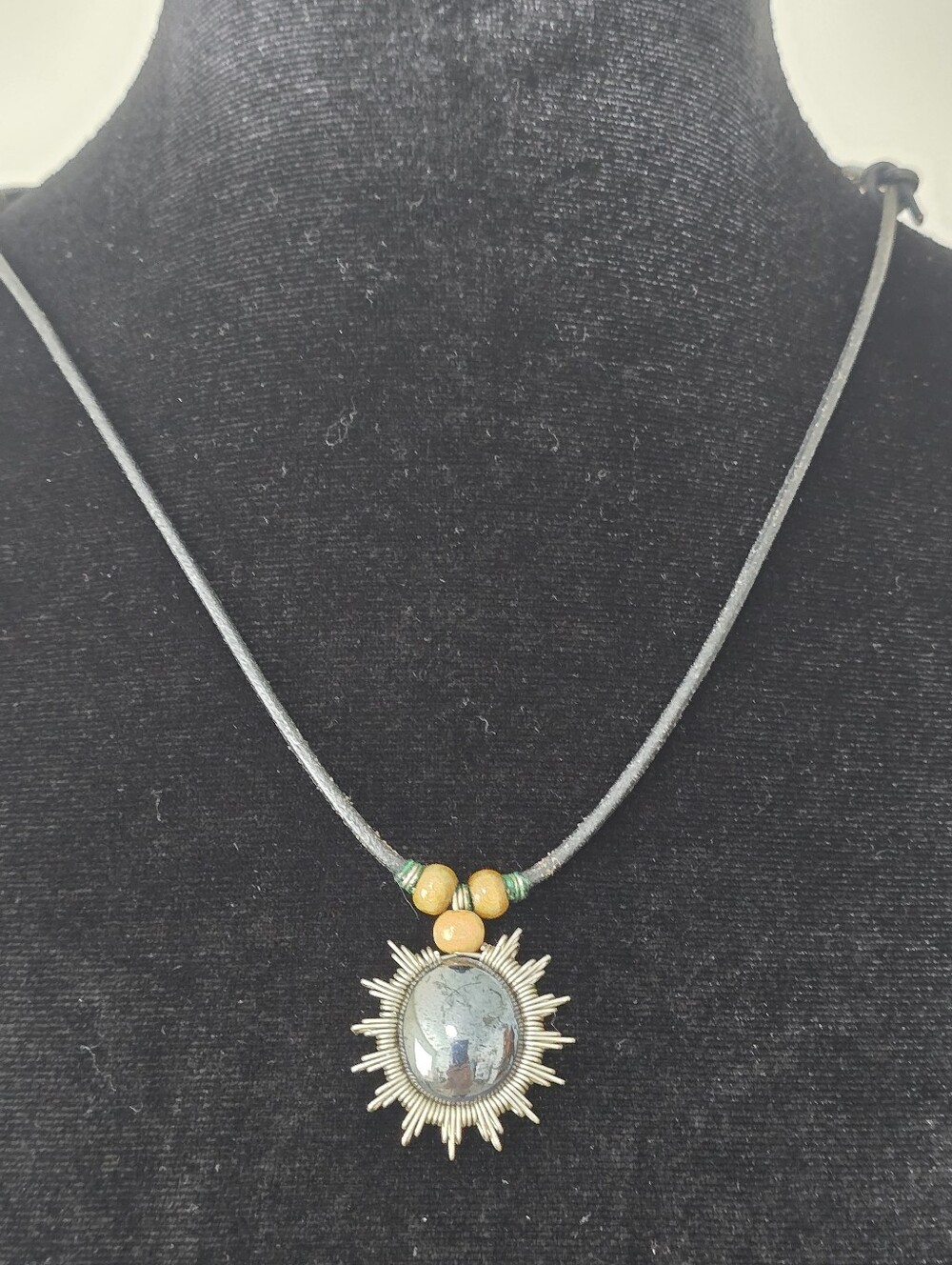 Sunburst Hematite Pendant Necklace with Wooden Beads - Black Cord